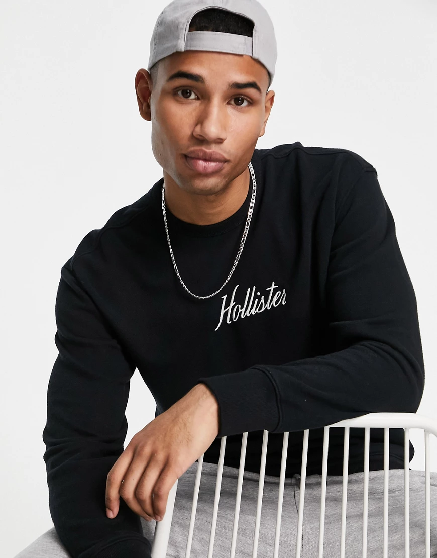 Hollister – Sweatshirt in Schwarz mit Logo-Schriftzug auf der Brust günstig online kaufen