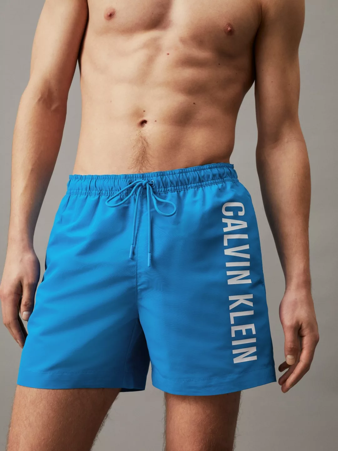 Calvin Klein Swimwear Badeshorts "MEDIUM DRAWSTRING", mit kontrastfarbenem günstig online kaufen