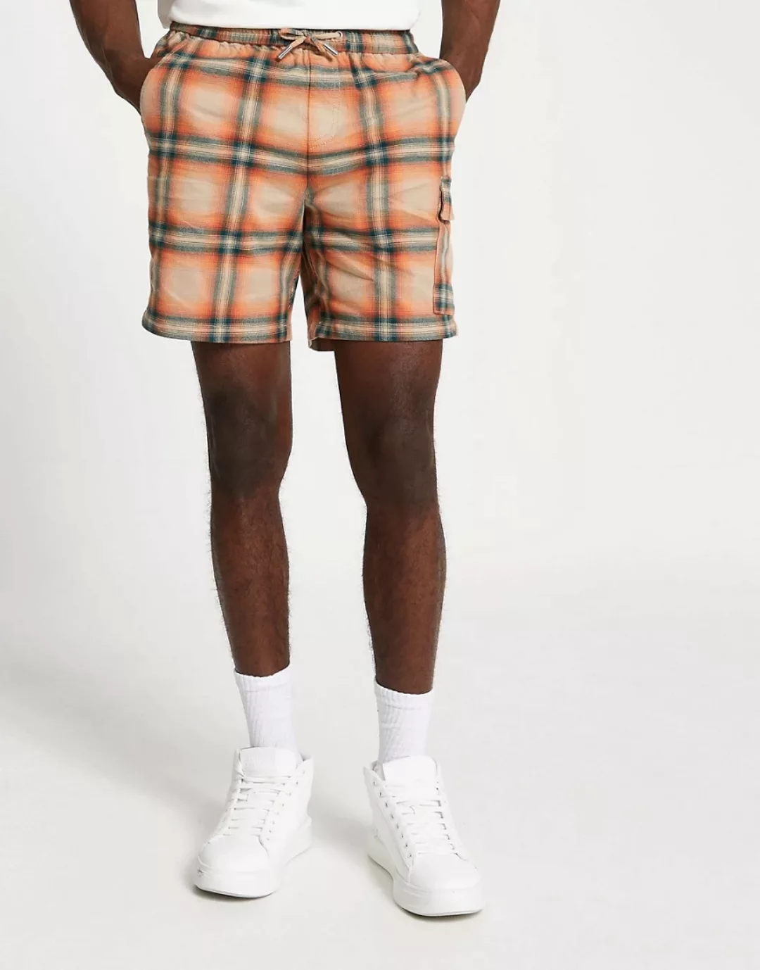 River Island – Karierte Shorts in Orange günstig online kaufen