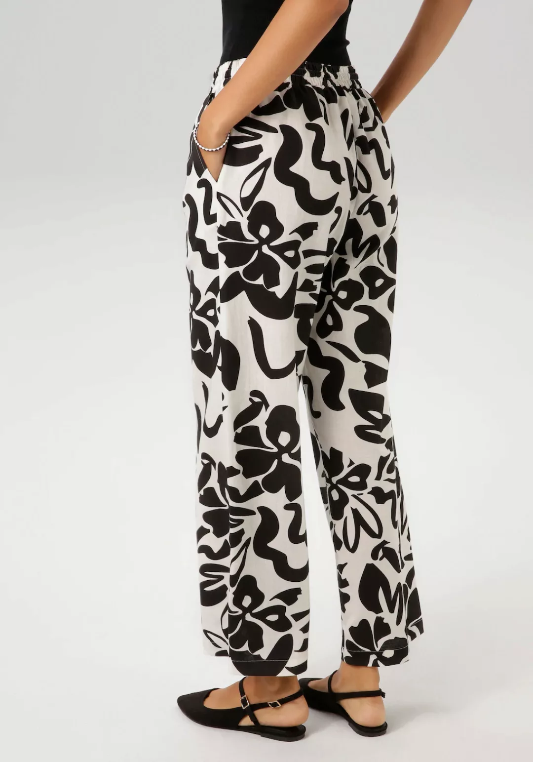 Aniston CASUAL Schlupfhose, mit großflächigen Blättern bedruckt günstig online kaufen