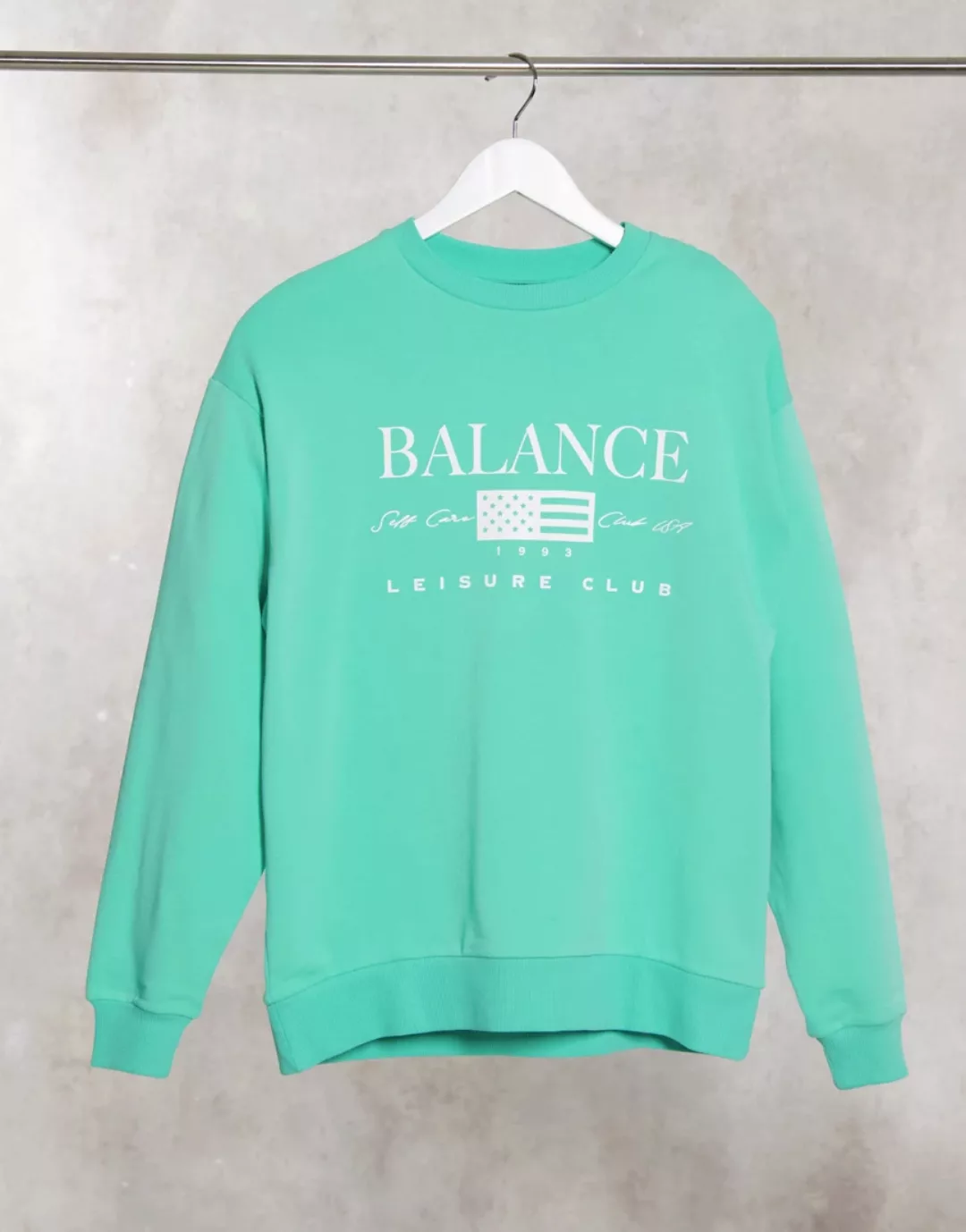 ASOS DESIGN – Oversize-Sweatshirt mit „Leisure Club“-Print in Grün günstig online kaufen