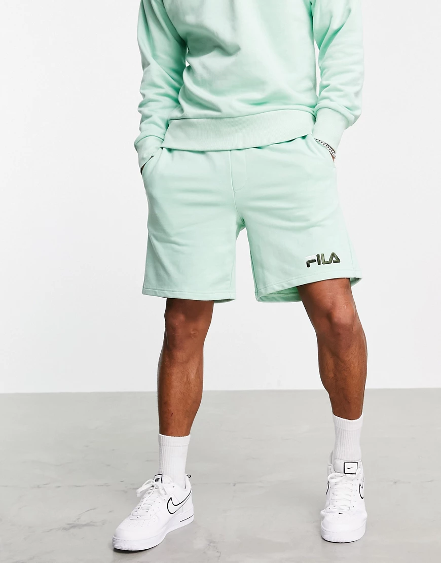 Puma – Darnell – Shorts in Minzgrün mit Logo günstig online kaufen