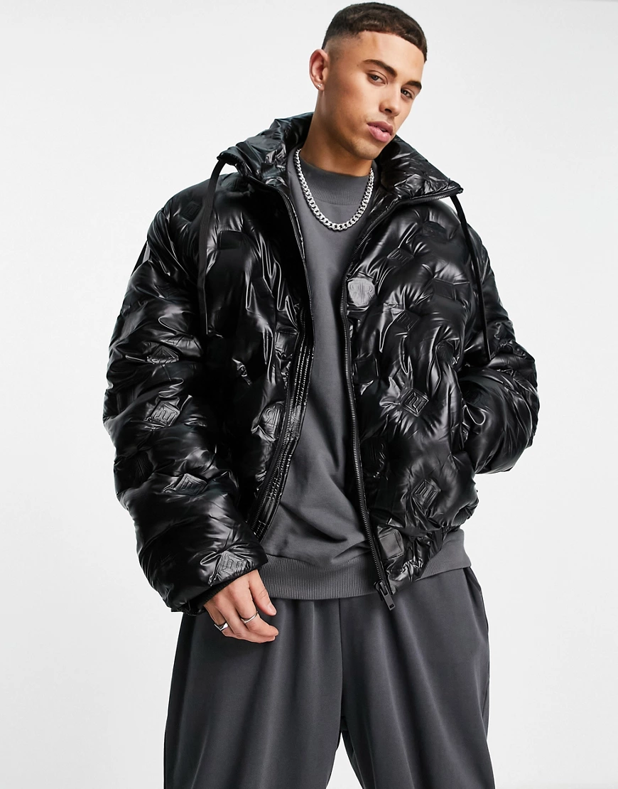 River Island – Oversize-Steppjacke in Schwarz mit Monogramm-Muster günstig online kaufen