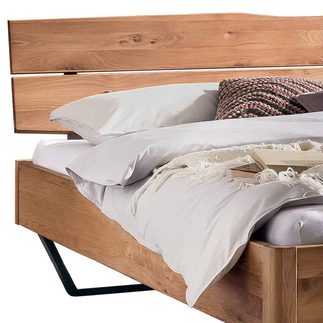 Industrial Bett 140x200 aus Wildeiche Massivholz Bügelgestell günstig online kaufen