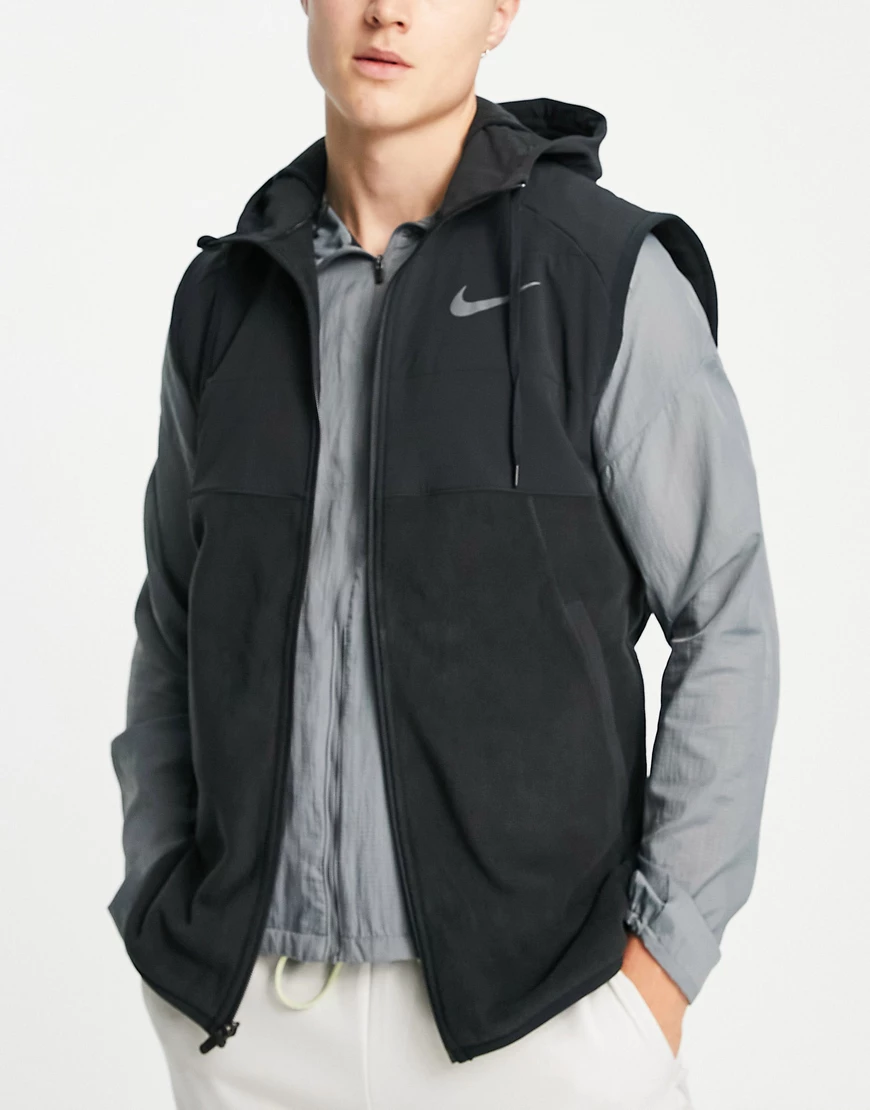 Nike Training – Therma-FIT – Gilet in Schwarz mit Kapuze und durchgehendem günstig online kaufen