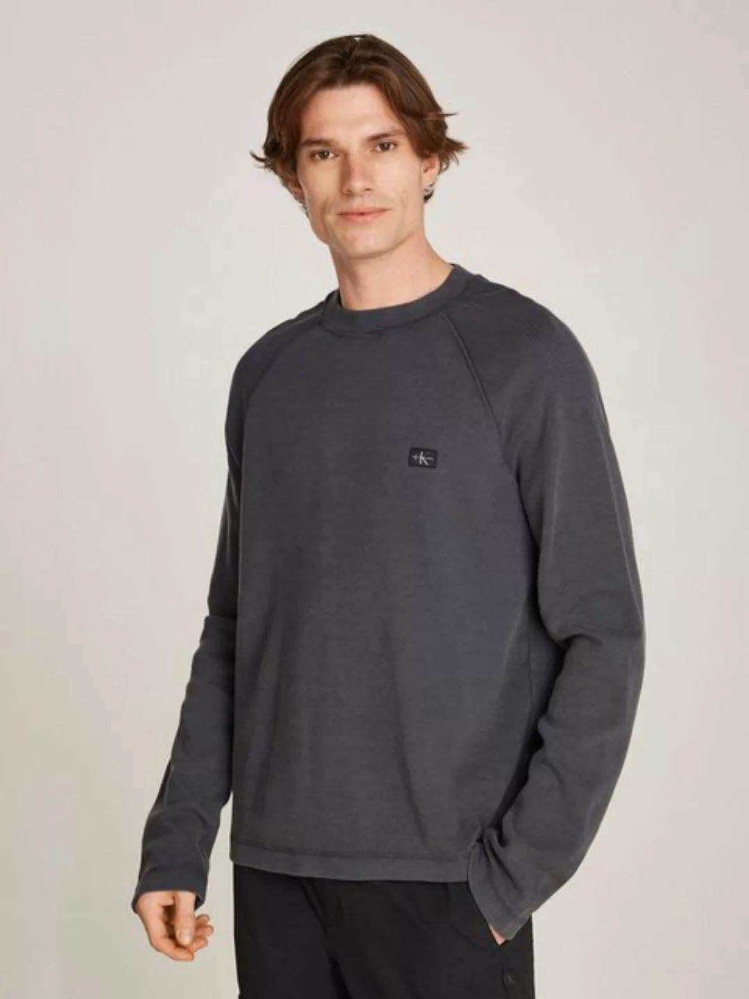 Calvin Klein Jeans Langarmshirt WASHED WOVEN LABEL WAFFLE RAGLAN in gewasch günstig online kaufen