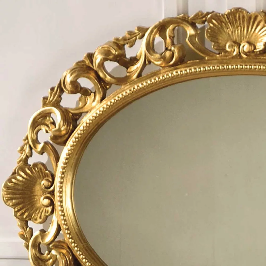 Design Spiegel in Goldfarben ovale Form günstig online kaufen