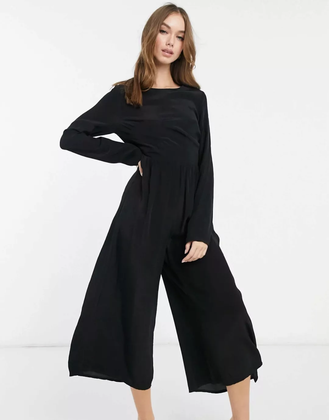 ASOS DESIGN – Langärmliger schwarzer Jumpsuit mit Knöpfen günstig online kaufen