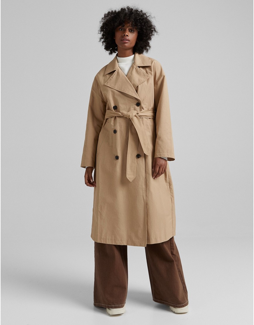 Bershka – Langer Trenchcoat in Beige-Neutral günstig online kaufen