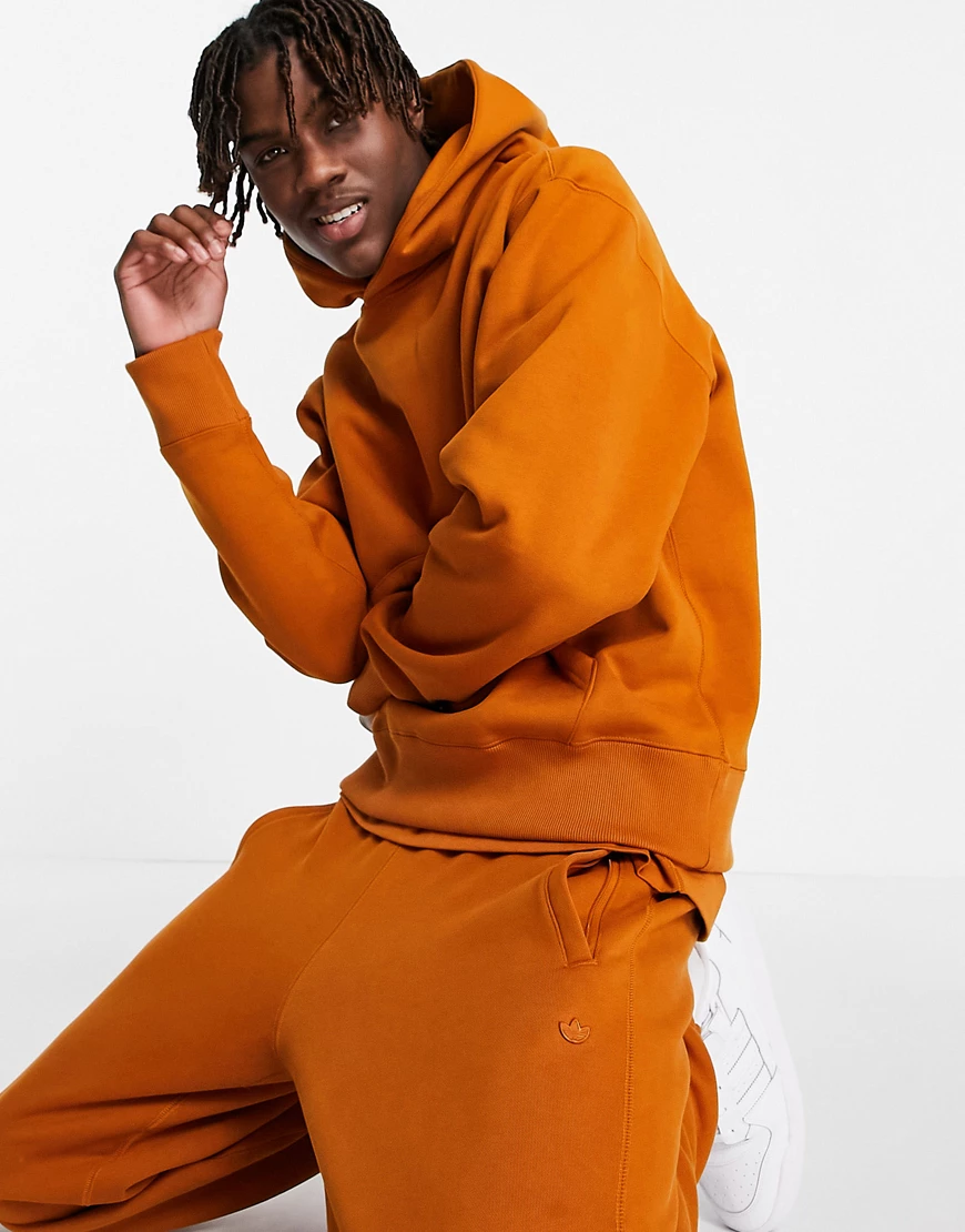 adidas Originals – adicolor Contempo – Kapuzenpullover in Dunkelorange günstig online kaufen