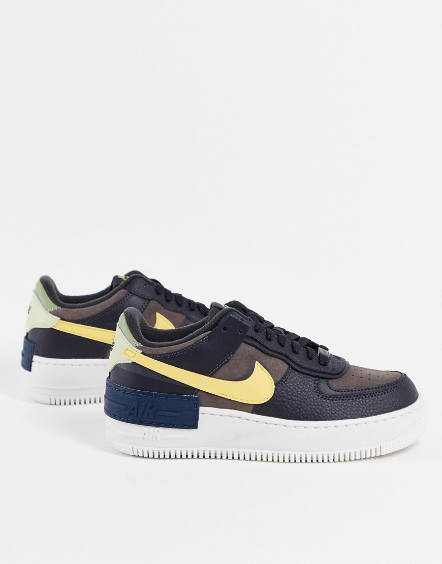 Nike – Air Force 1 Shadow – Sneaker in Schwarz und Gold-Weiß günstig online kaufen