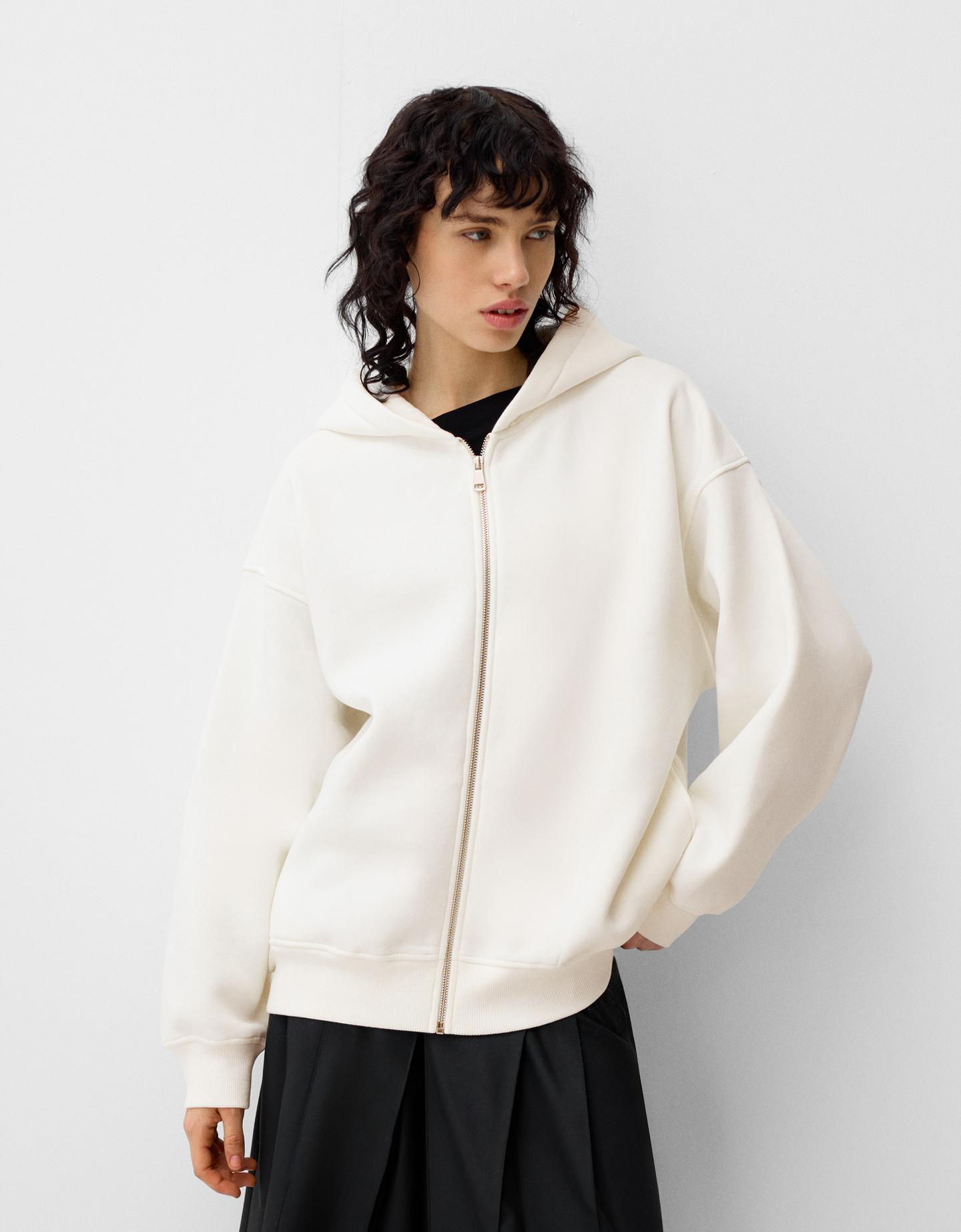 Bershka Hoodie Mit Kapuze, Reißverschluss Und Print Damen M Grbrochenes Wei günstig online kaufen