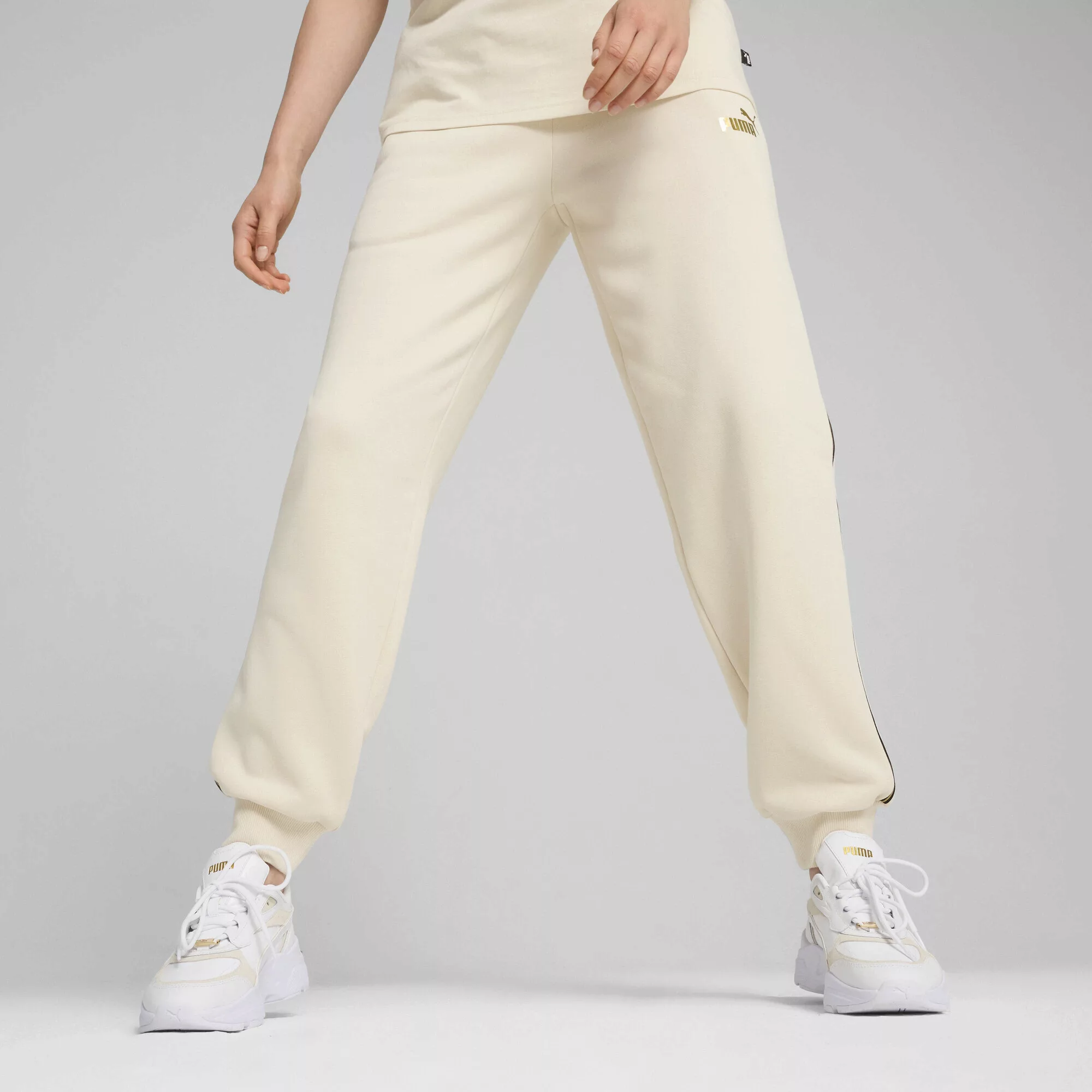 PUMA Trainingshose "ESS TAPE MINIMAL GOLD SWEATPANTS FL" günstig online kaufen