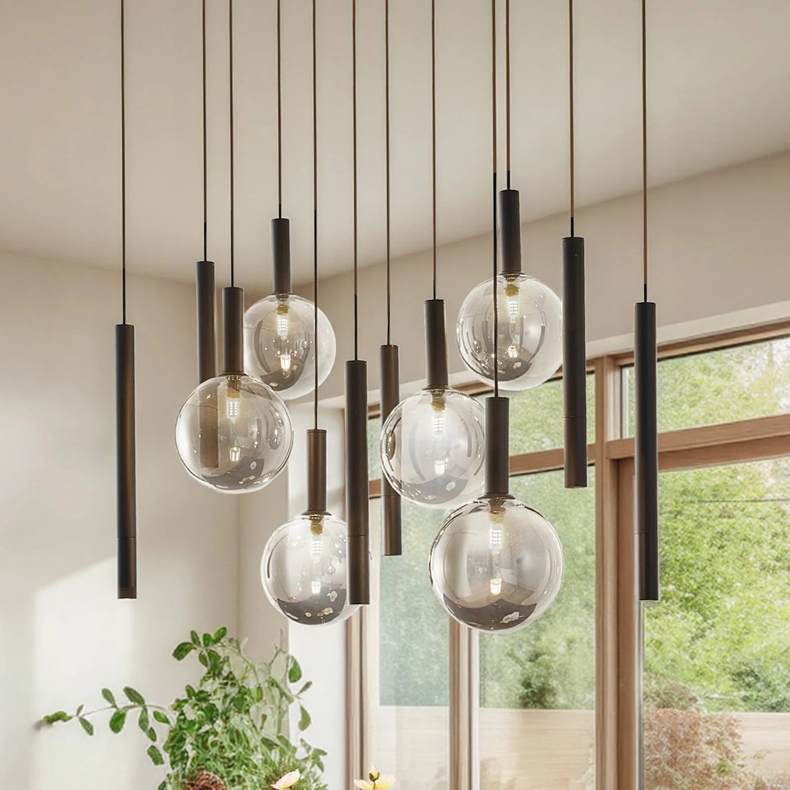 Lucande Hängeleuchte Lumavia, 12-flg, Glas, schwarz/klar, G9 günstig online kaufen