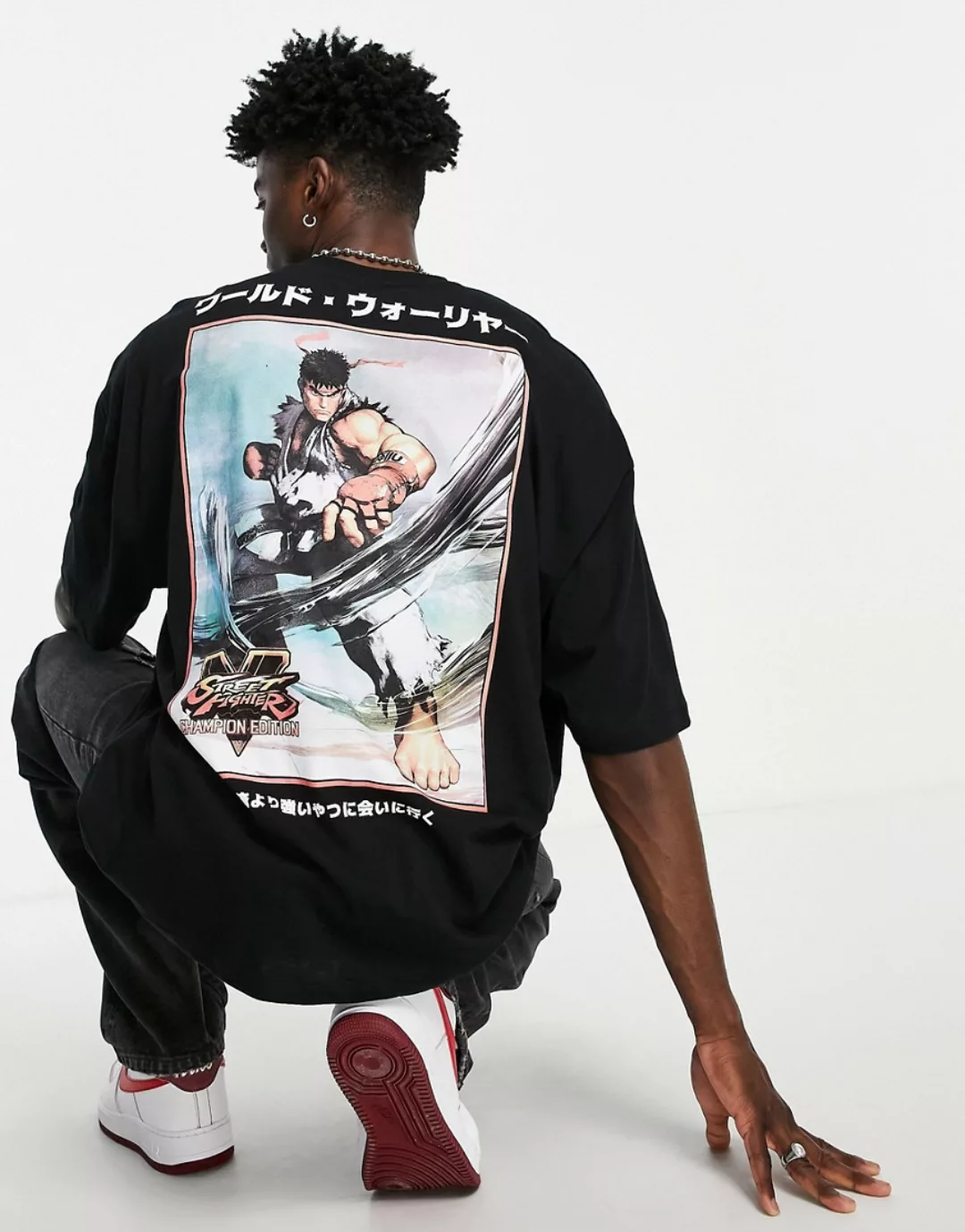 ASOS DESIGN – T-Shirt in Schwarz mit Streetfighter-Grafikprint günstig online kaufen