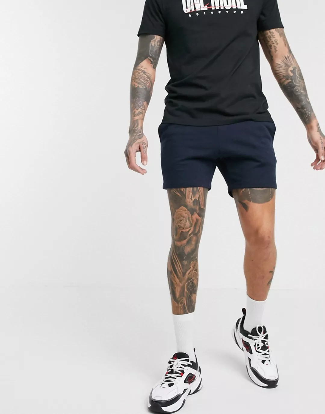 ASOS DESIGN – Enge, kürzer geschnittene Jersey-Shorts in Marineblau günstig online kaufen