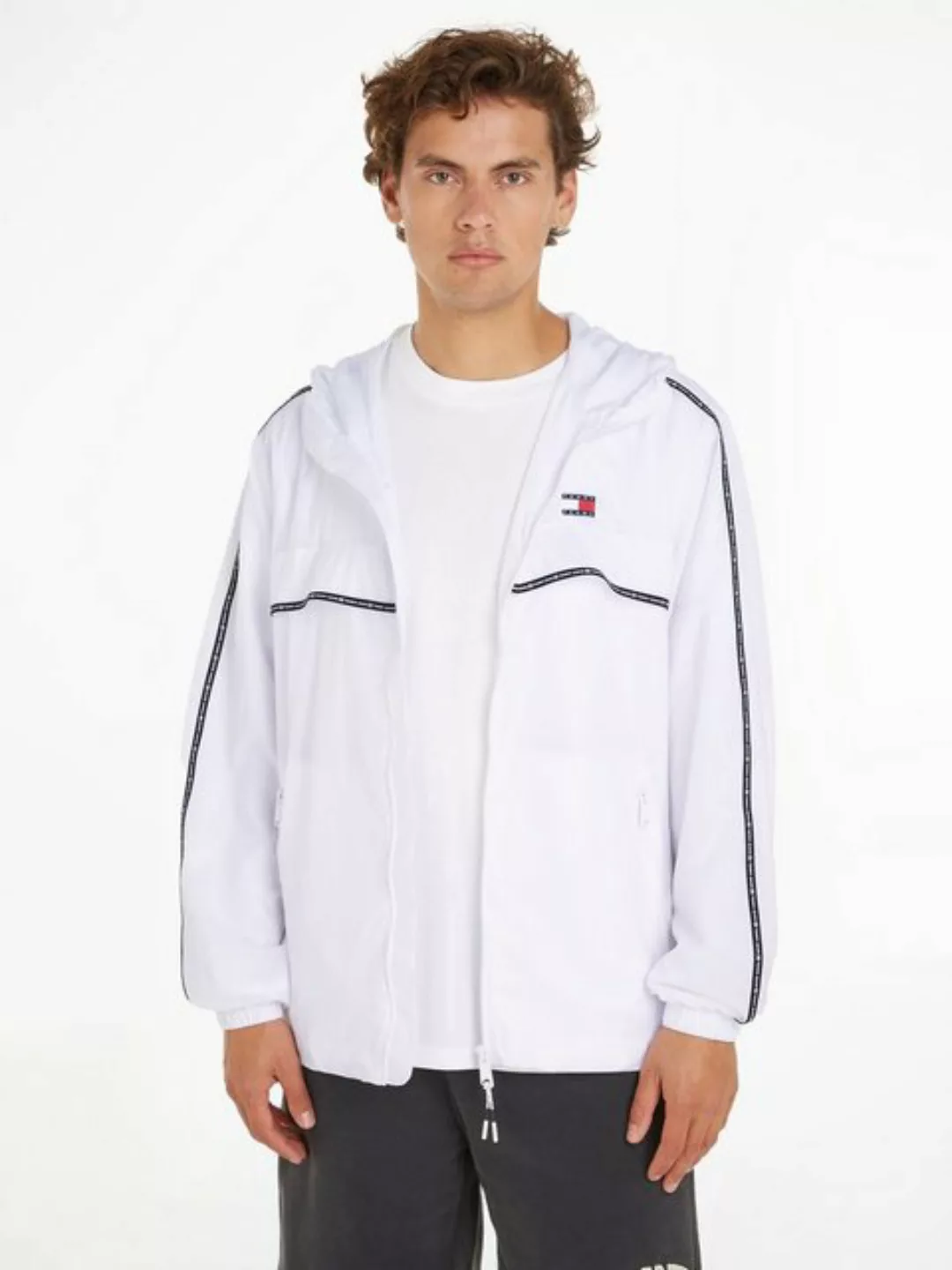 Tommy Jeans Blouson TJM CHICAGO TAPE WINDBREAKER EXT Tape mit Markenschrift günstig online kaufen