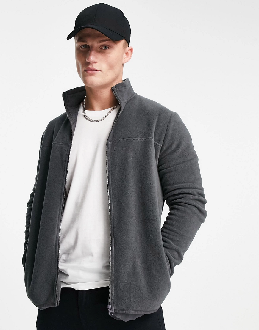 ASOS DESIGN – Trainingsjacke aus Polar-Fleece in verwaschenem Schwarz günstig online kaufen