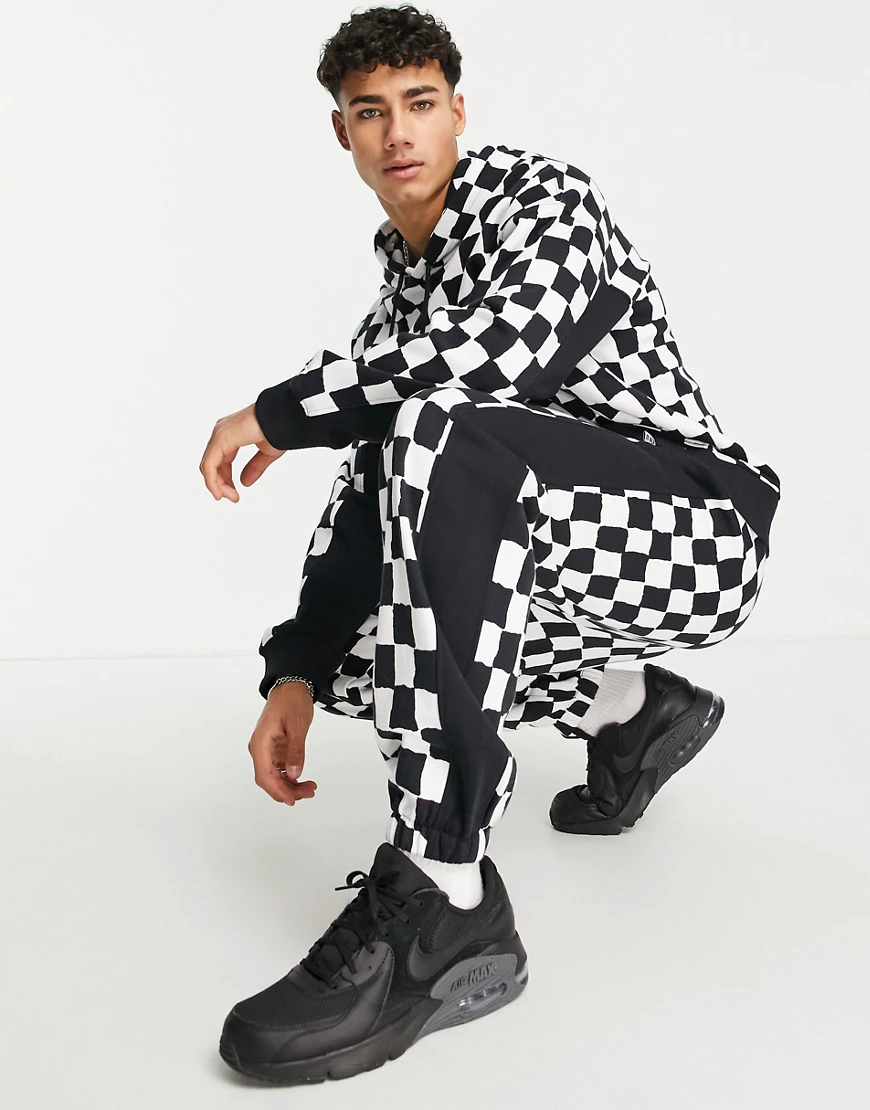 Topman – Oversize-Jogginghose in Schwarz und Weiß mit Schachbrettmuster, Ko günstig online kaufen