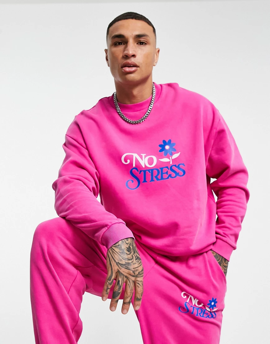 ASOS DESIGN – Oversize-Sweatshirt in rosa Acid-Waschung mit Textprint, Komb günstig online kaufen