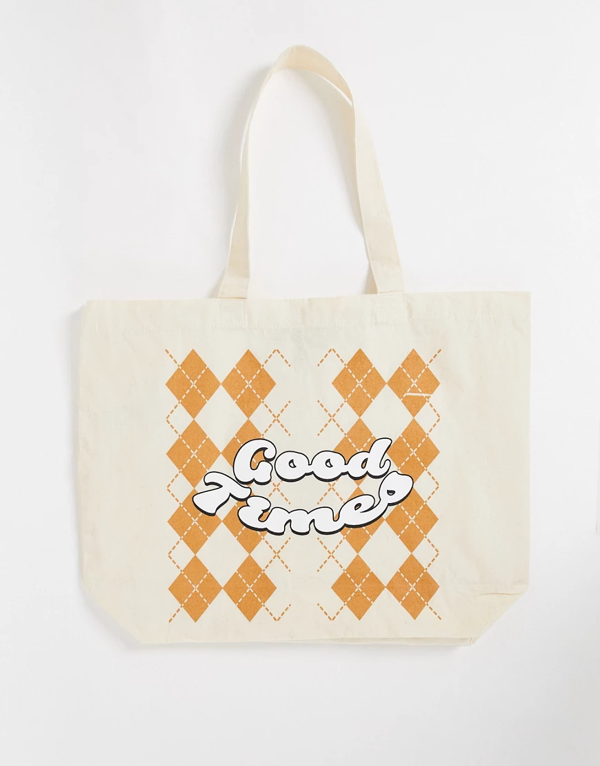 New Girl Order – Große Tragetasche in Cremeweiß und Orange mit „Good Times“ günstig online kaufen