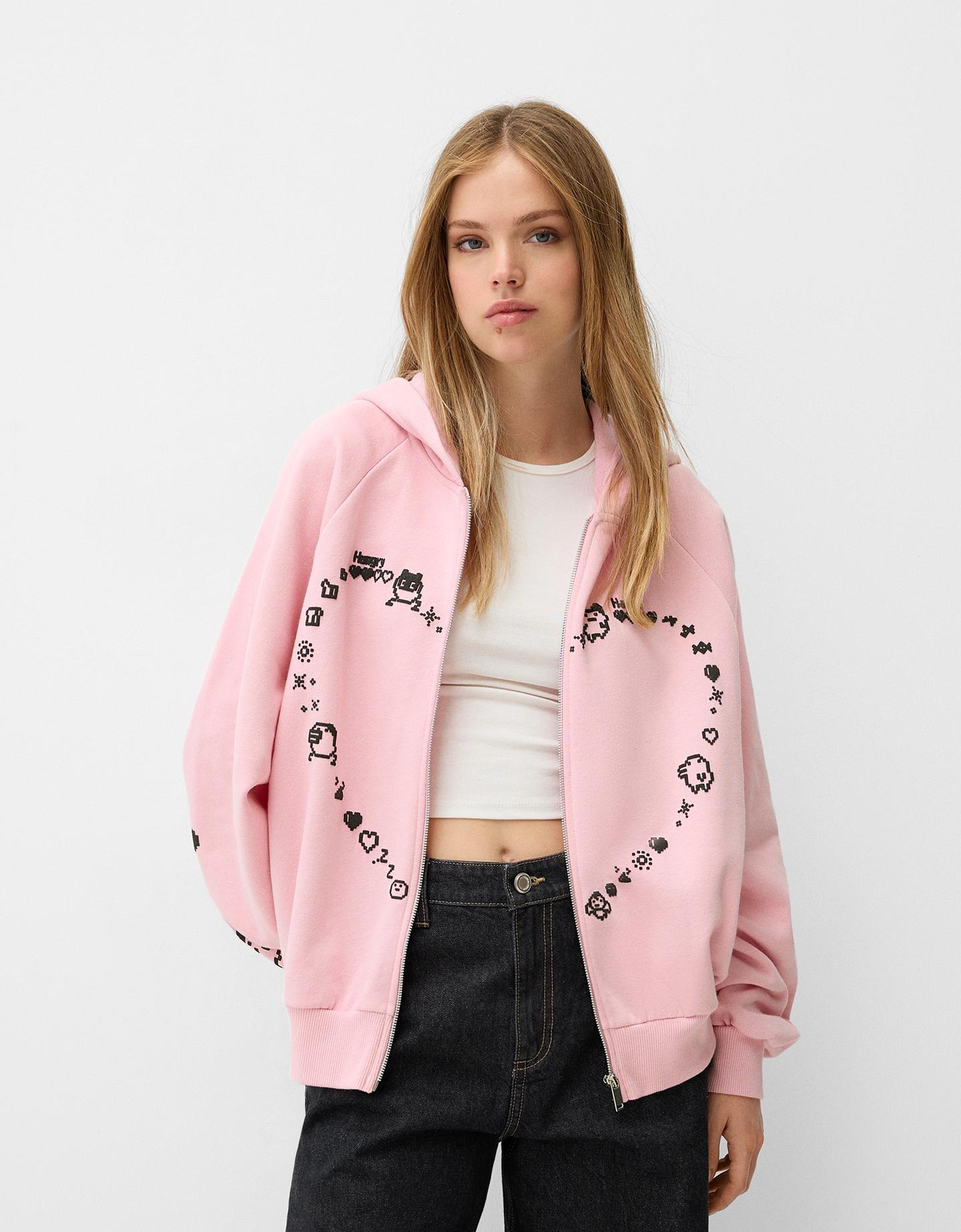 Bershka Hoodie Tamagotchi Mit Reißverschluss Und Kapuze Damen Xs Rosa günstig online kaufen