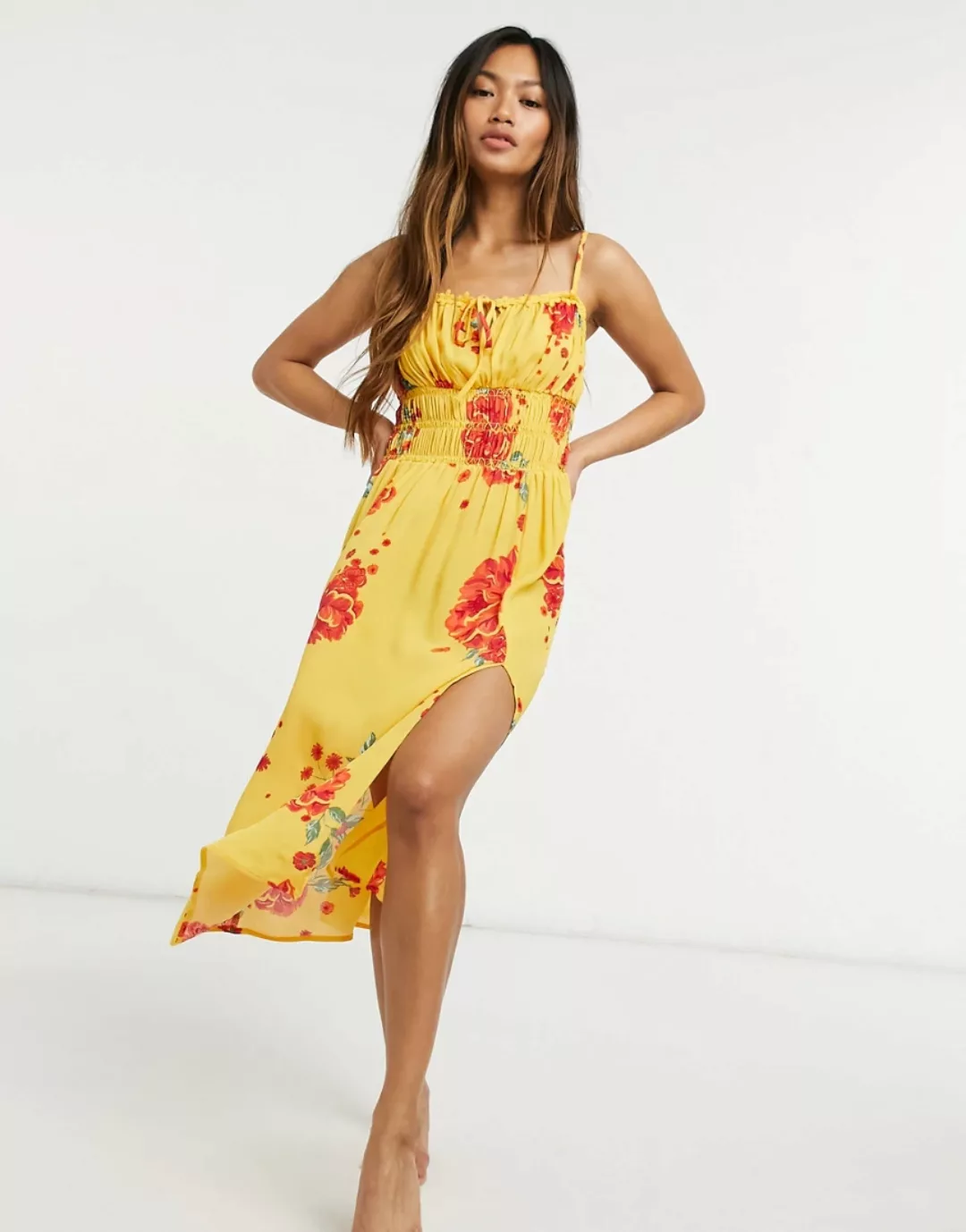 River Island – Gerafftes Midi-Strandkleid mit Blumenmuster in Orange günstig online kaufen