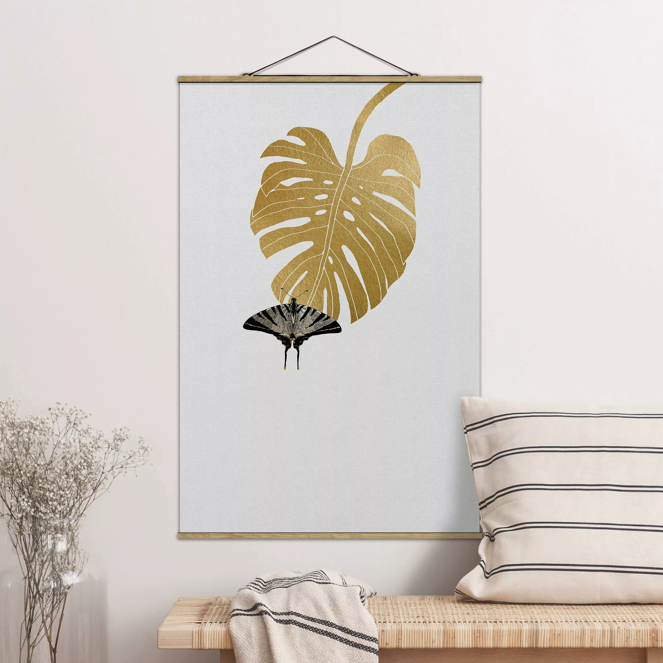 Stoffbild mit Posterleisten Goldene Monstera mit Schmetterling günstig online kaufen