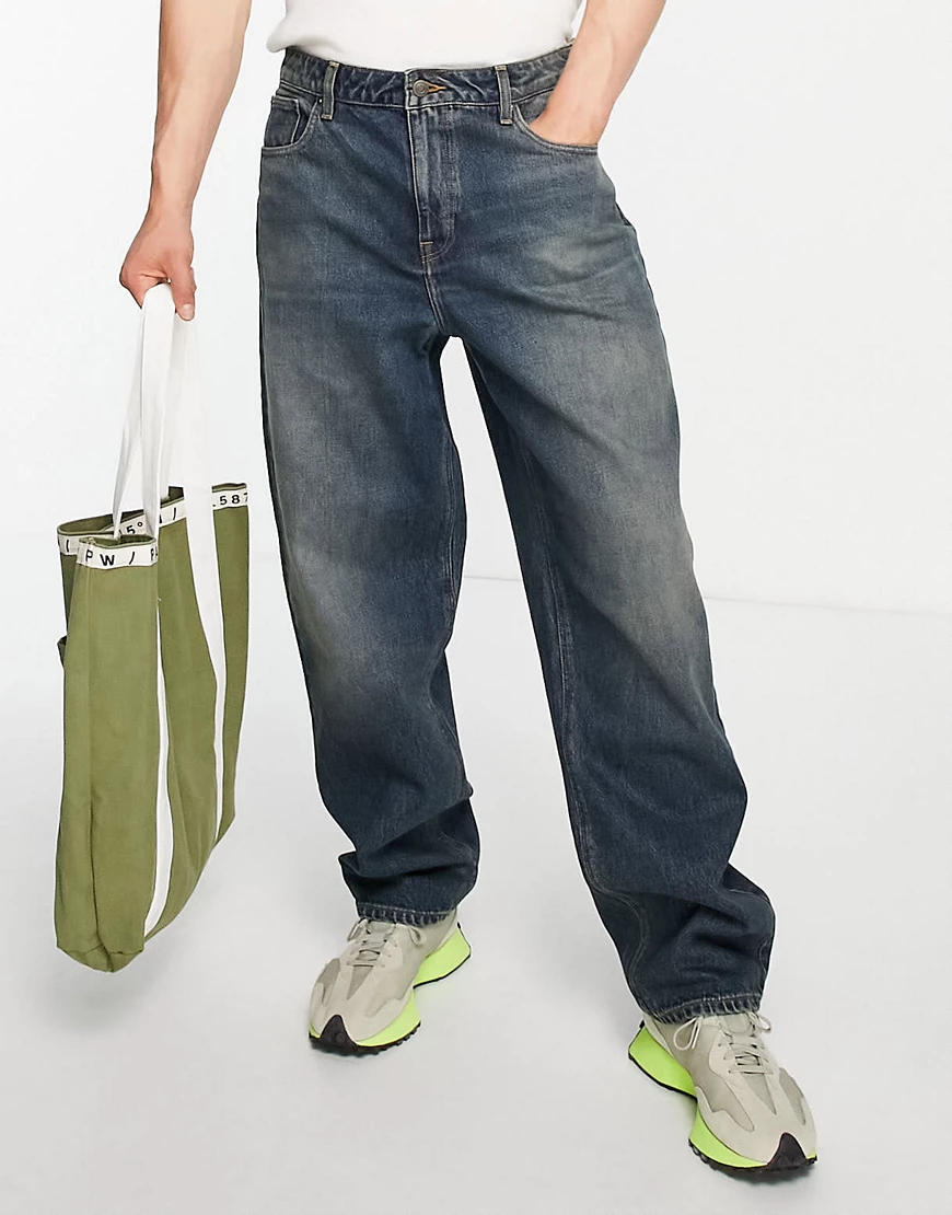 ASOS DESIGN – Baggy-Jeans in dunkel getönter Waschung-Blau günstig online kaufen