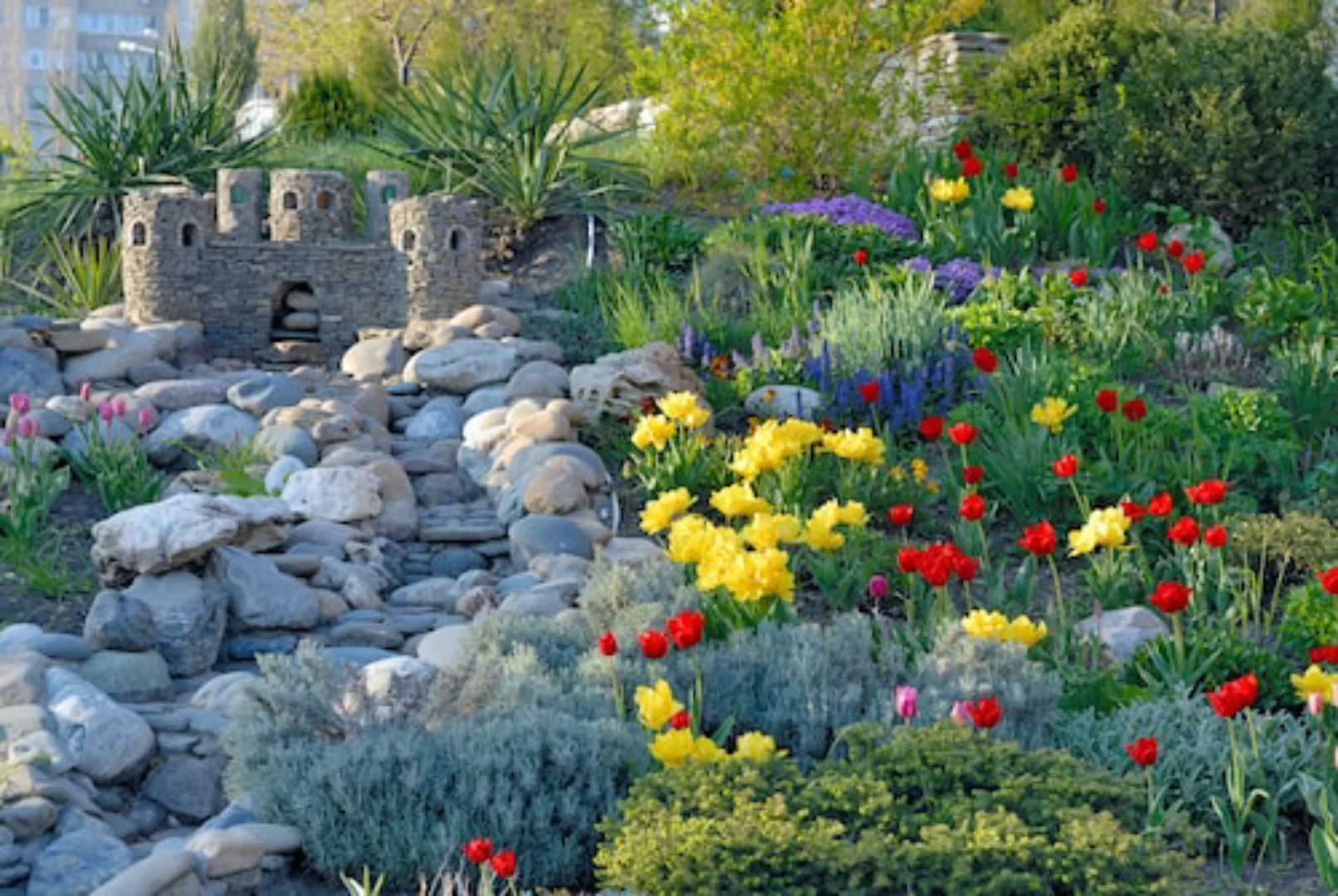 Papermoon Fototapete »GARTEN-BÄUME BLUMEN PFLANZEN PARK STEINE GRÜN BLÜTEN« günstig online kaufen