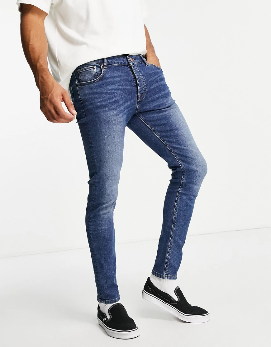 ASOS DESIGN – Eng geschnittene Jeans aus Bio-Baumwollmix in dunkler Waschun günstig online kaufen