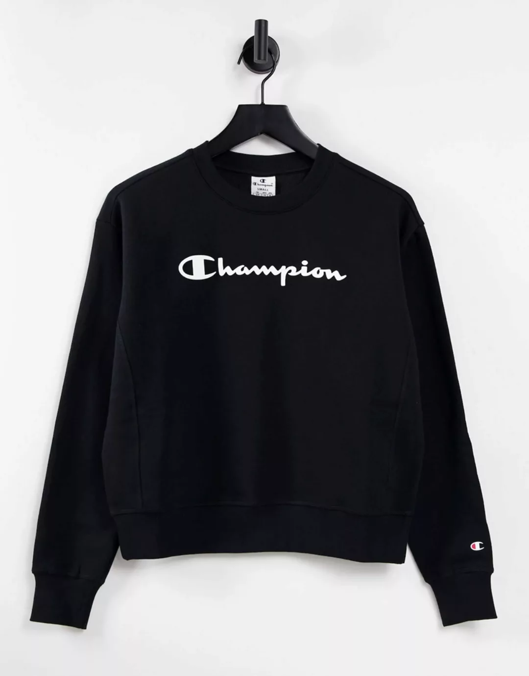 Champion – Kastig geschnittenes Sweatshirt mit großem Logo in Schwarz günstig online kaufen