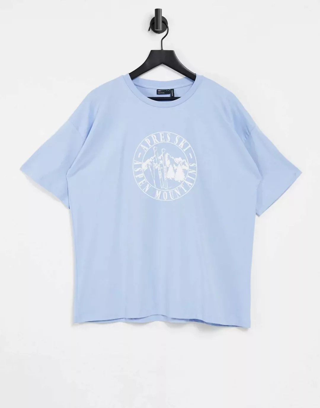 ASOS DESIGN – Oversize-T-Shirt mit Après-Ski-Print in verwaschenem Blau günstig online kaufen