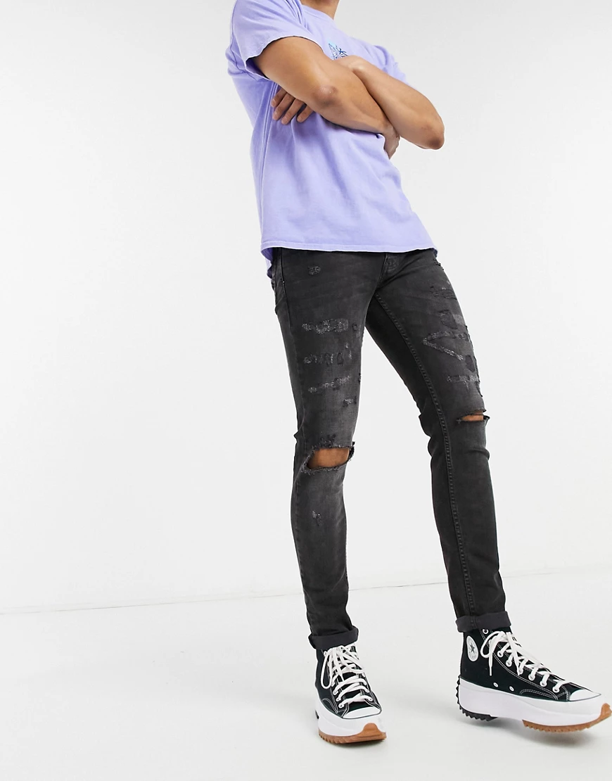 Topman – Eng geschnittene Stretch-Jeans aus Bio-Baumwollmix mit Rissen in v günstig online kaufen