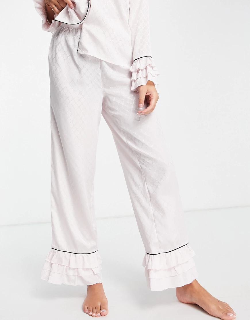 River Island – Pyjamahose in Rosa mit gerüschtem Hosensaum günstig online kaufen