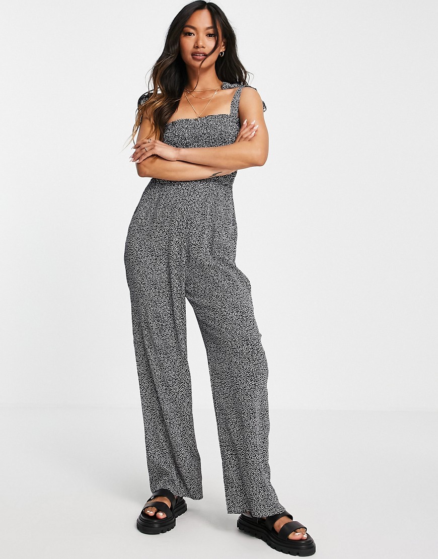 & Other Stories – Hänger-Jumpsuit mit Blumenmuster-Schwarz günstig online kaufen