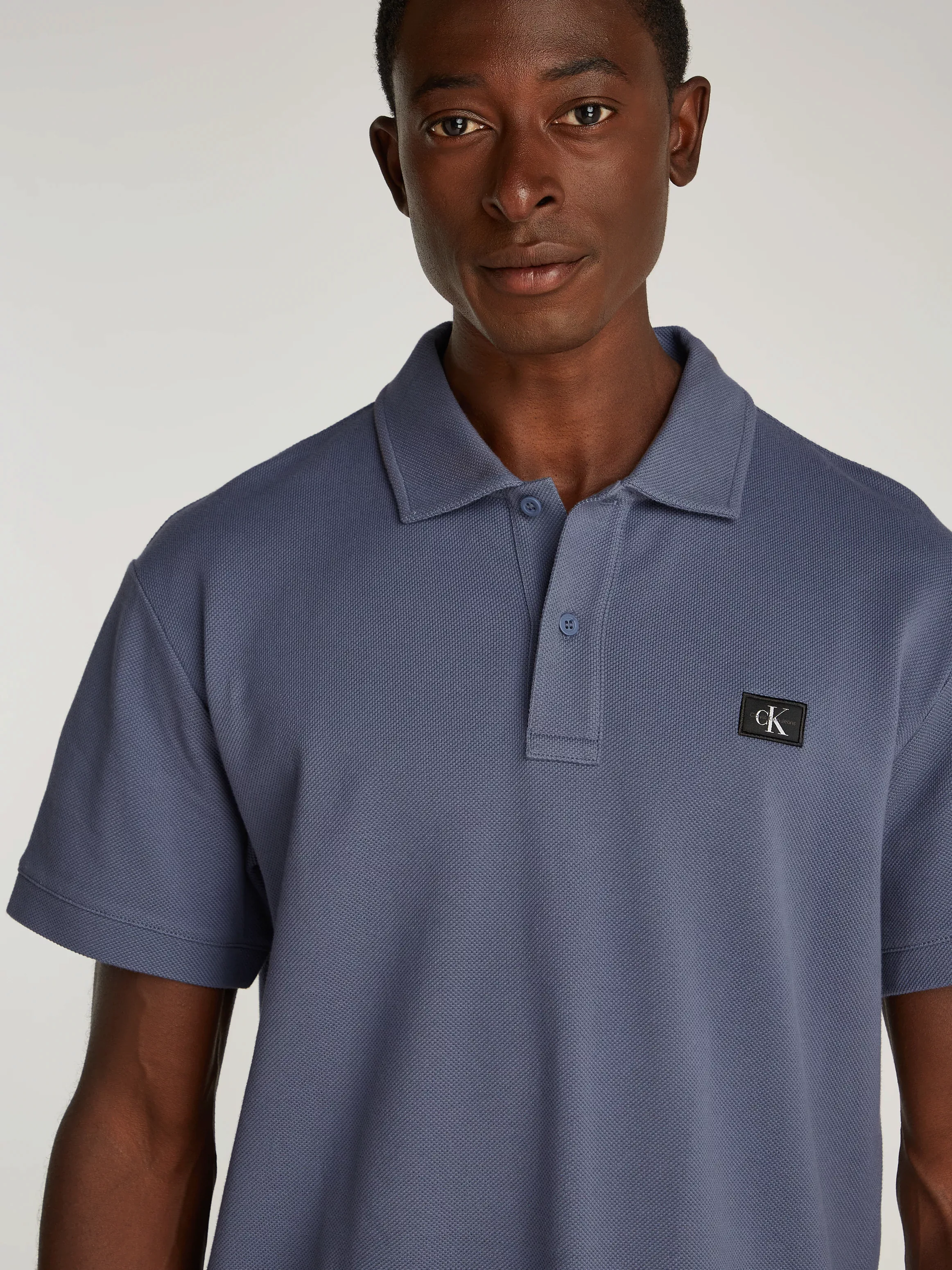 Calvin Klein Jeans Poloshirt "WOVEN LABEL POLO", Logodruck günstig online kaufen