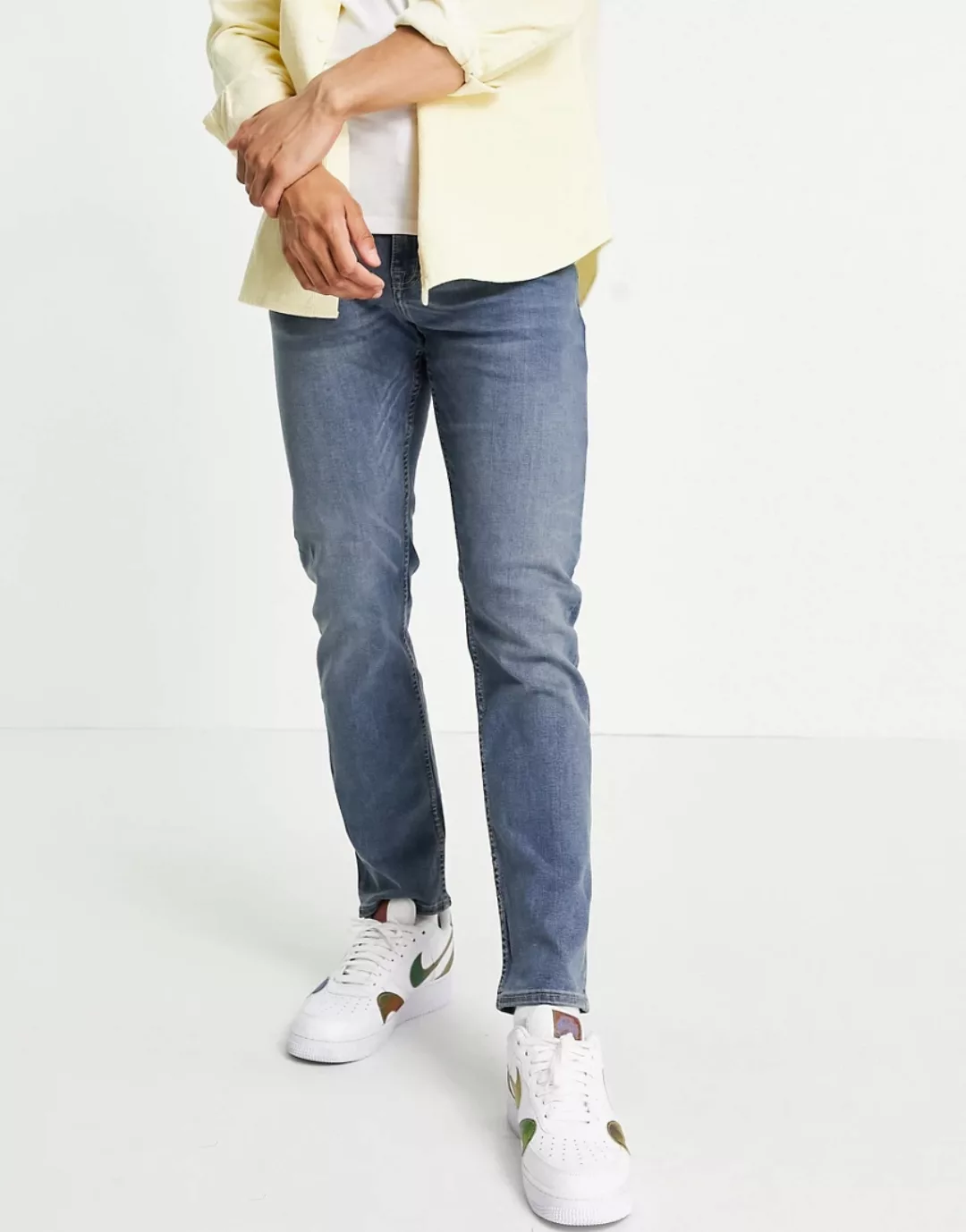 New Look – Schmal geschnittene Jeans in dunkelblauer Waschung günstig online kaufen