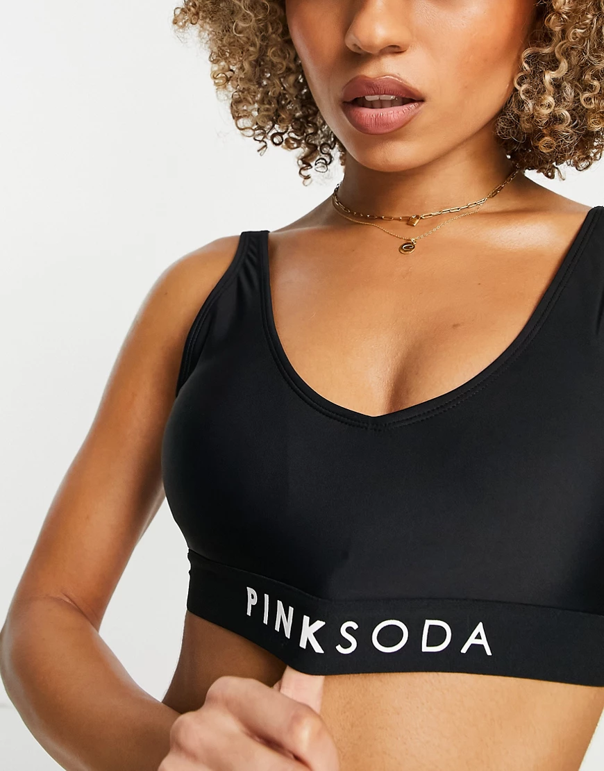 Pink Soda – Bikinioberteil in Schwarz mit Logo günstig online kaufen