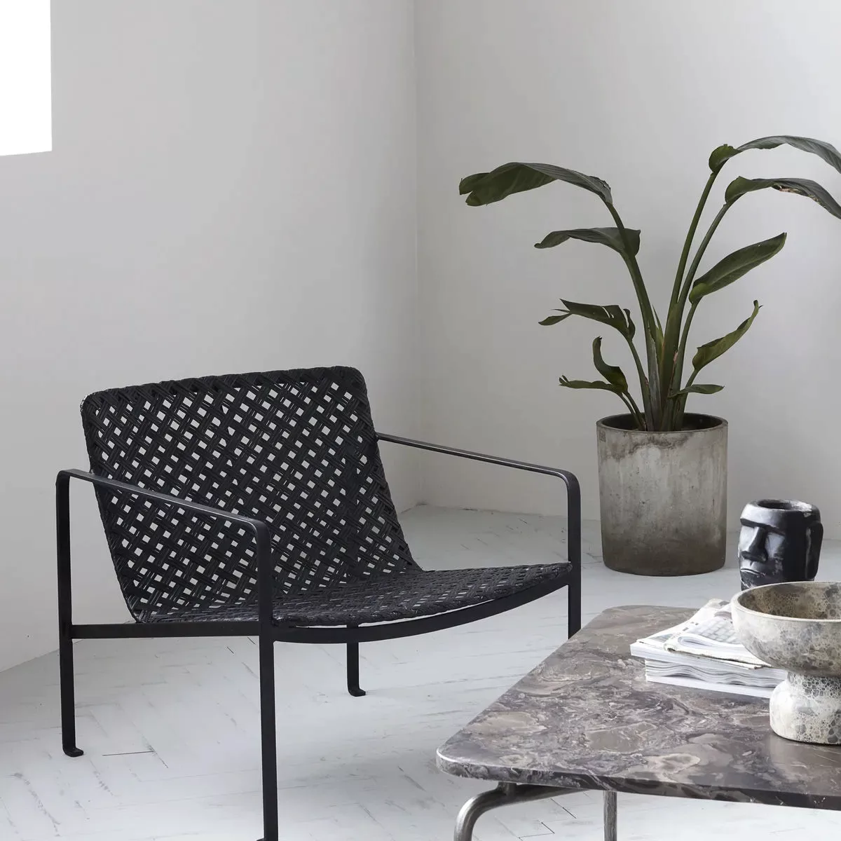 Lounge Stuhl Habra in Schwarz aus Metall und Rattan günstig online kaufen