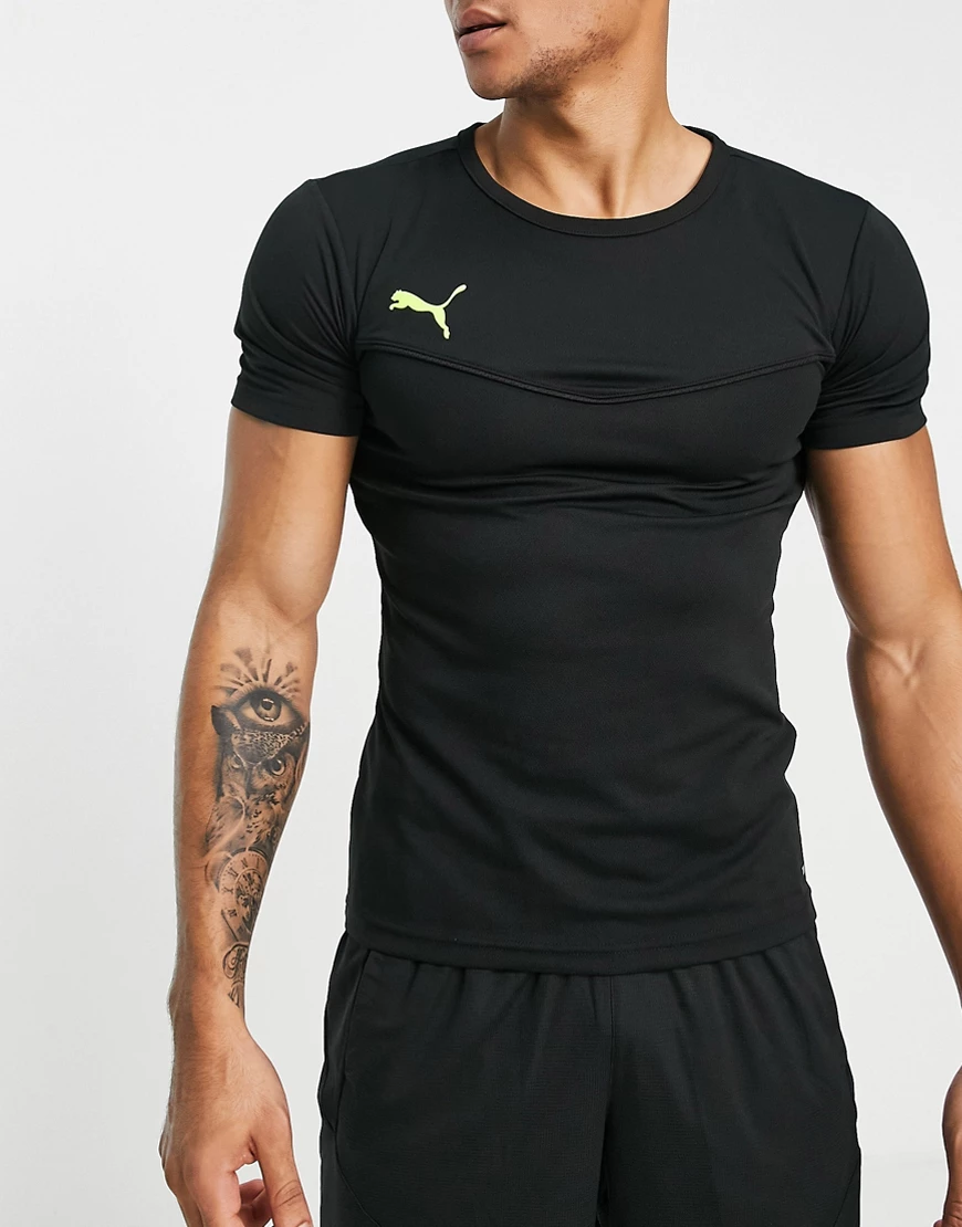 PUMA – Football Rise – Sport-T-Shirt in Schwarz mit Detail in leuchtendem G günstig online kaufen
