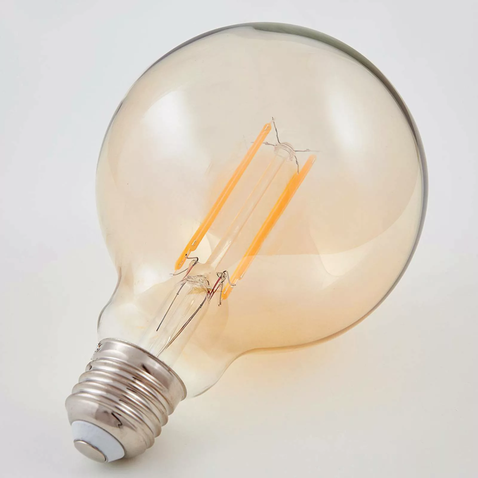 E27 LED-Globelampe Filament 6W 500lm, amber 1.800K günstig online kaufen