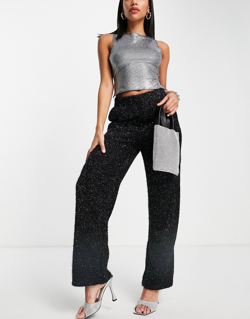 Vero Moda – Flauschige, schwarz glitzernde Hose mit weitem Bein günstig online kaufen