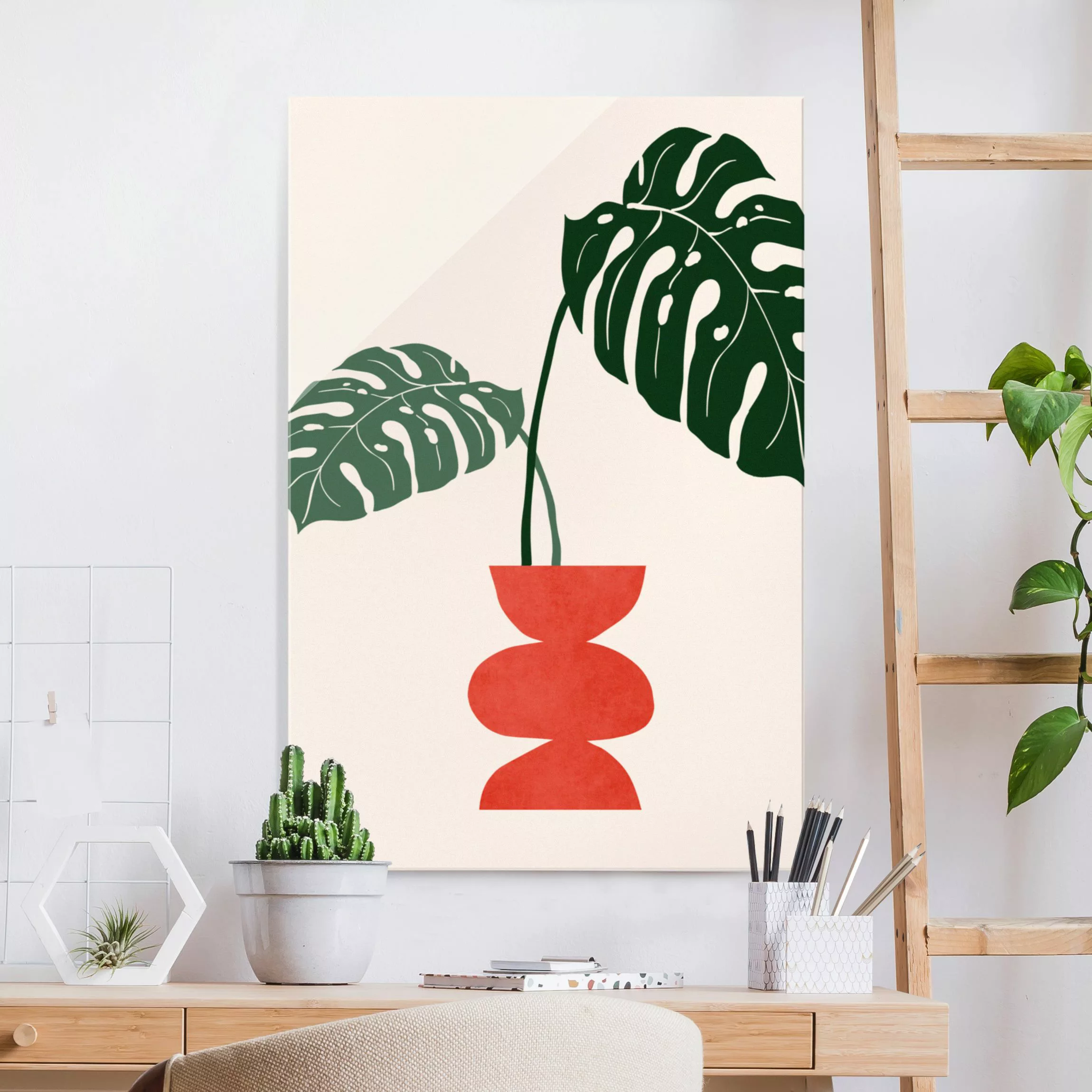 Glasbild Monstera in roter Vase günstig online kaufen