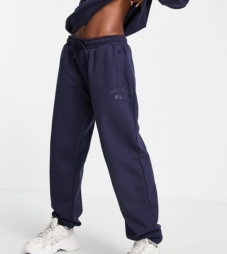 Fila – Oversize-Jogginghose in Marineblau mit gleichfarbigem Logo günstig online kaufen