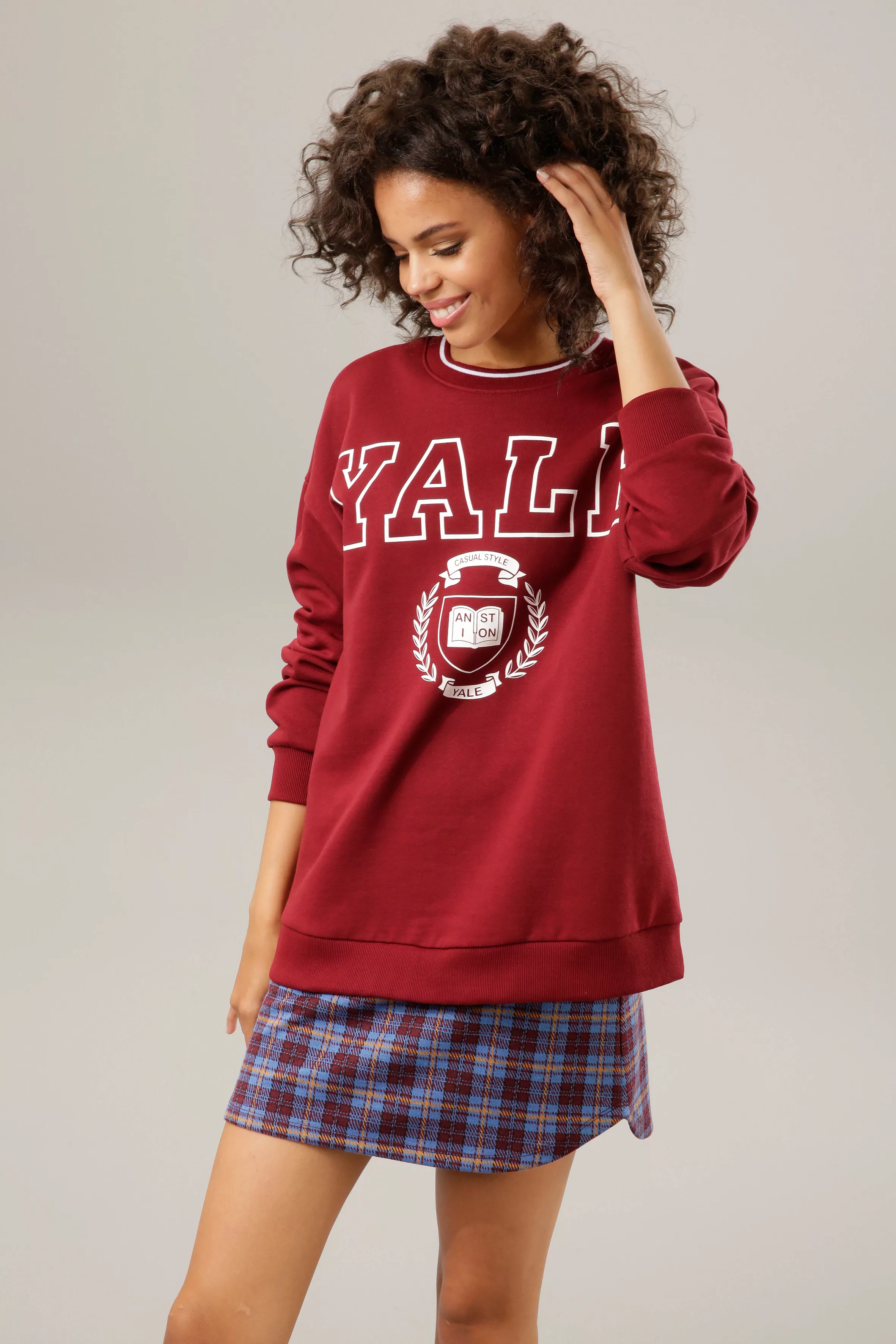 Aniston CASUAL Sweatshirt, mit "YALE"-Schriftzug und Druck im Vorderteil günstig online kaufen