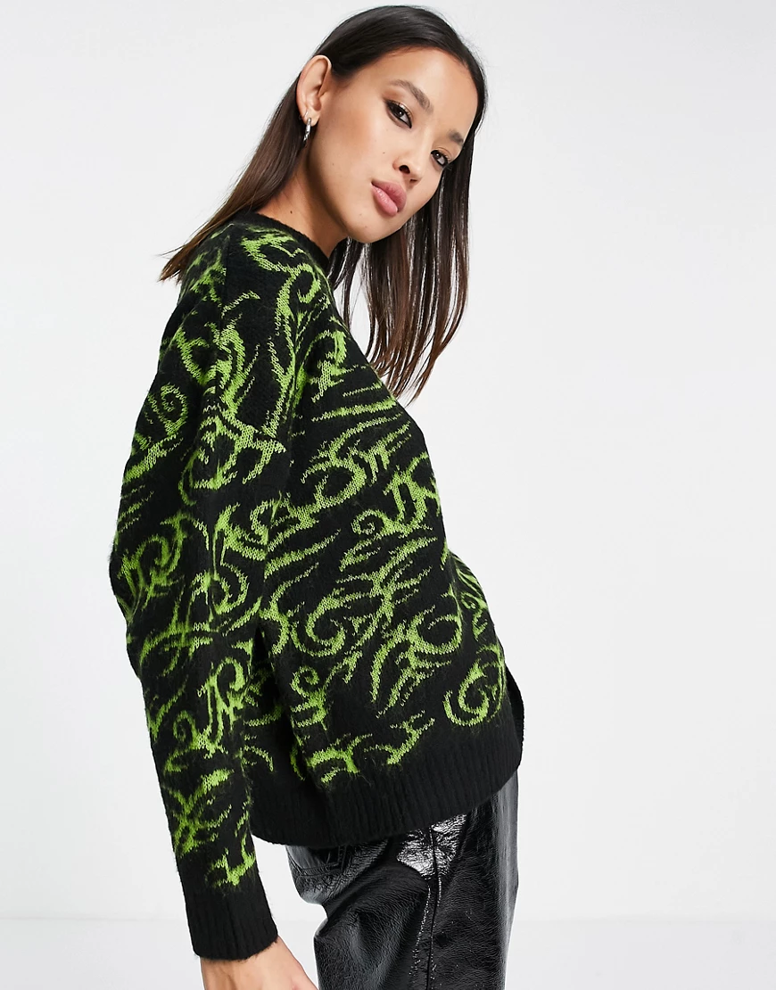 ASOS DESIGN – Oversize-Pullover in Schwarz mit Tattoo-Muster günstig online kaufen