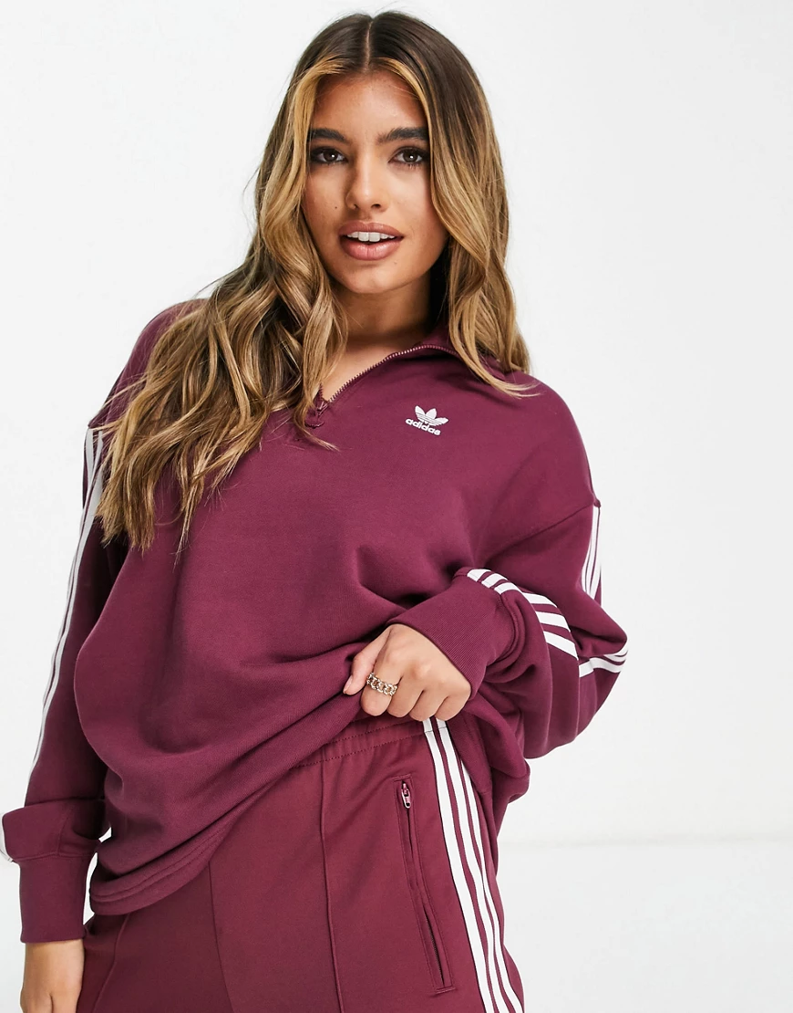adidas Originals – adicolor – Sweatshirt in Karmesinrot mit den drei Streif günstig online kaufen