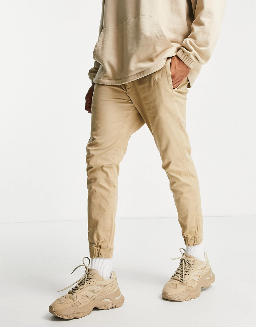 Pull&Bear – Chino-Jogginghose in Beige-Neutral günstig online kaufen