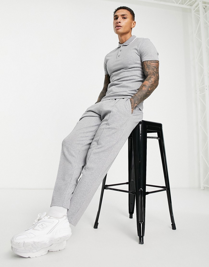 ASOS DESIGN – Elegante, schmal zulaufende Jogginghose aus grauem strukturie günstig online kaufen